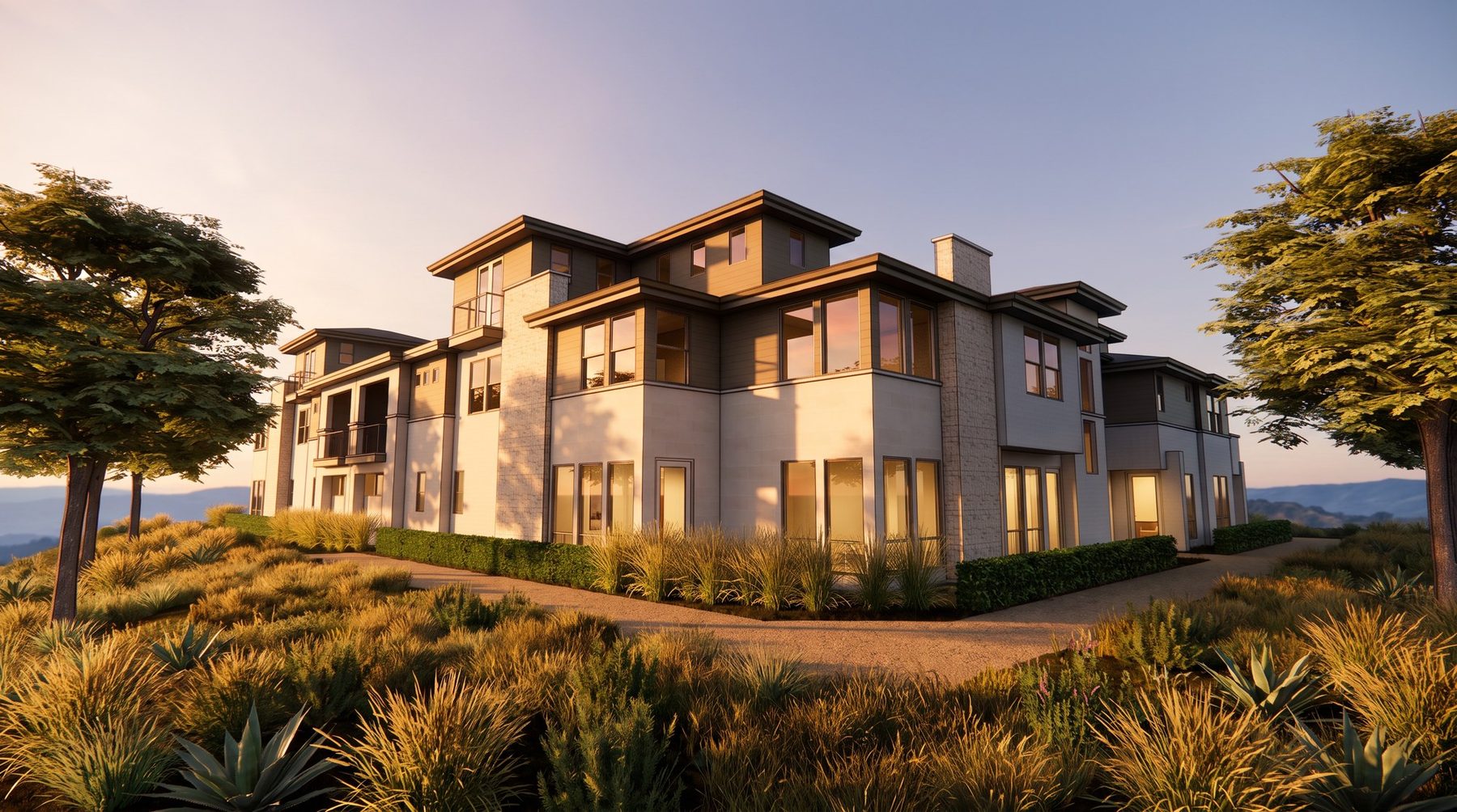 Mission Valley multifamily condominium building at golden-hour sunset, warm side-light across cream stucco